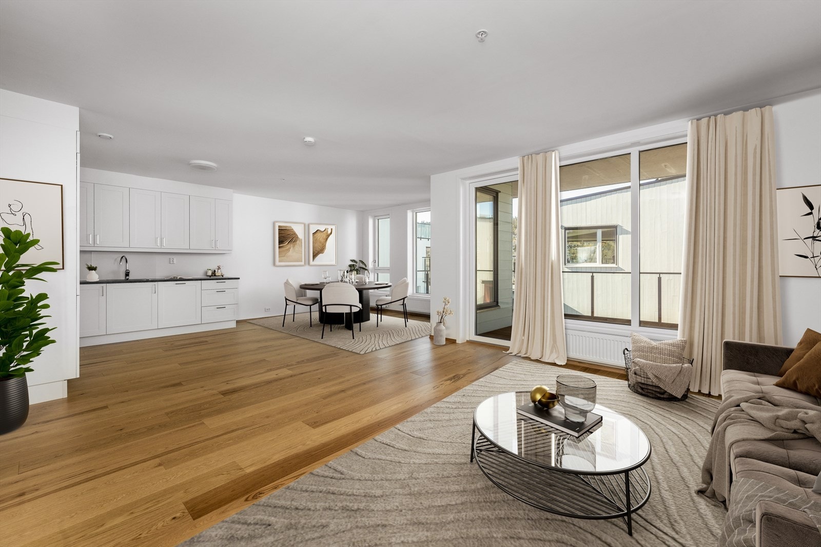 Romslig stuekjøkkenløsning med direkte utgang til balkong (digital møblering/illustrasjonsfoto - avvik kan forekomme) Galleribilde