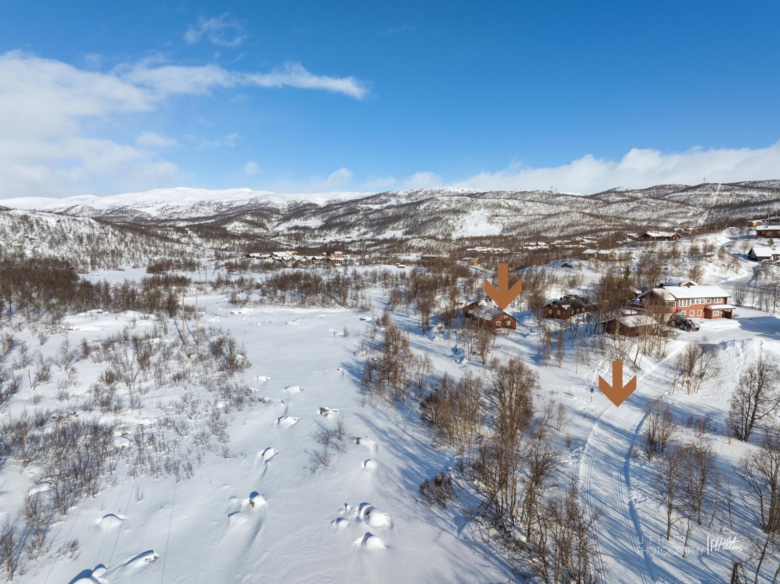 Skiløypa slynger seg like forbi. Galleribilde