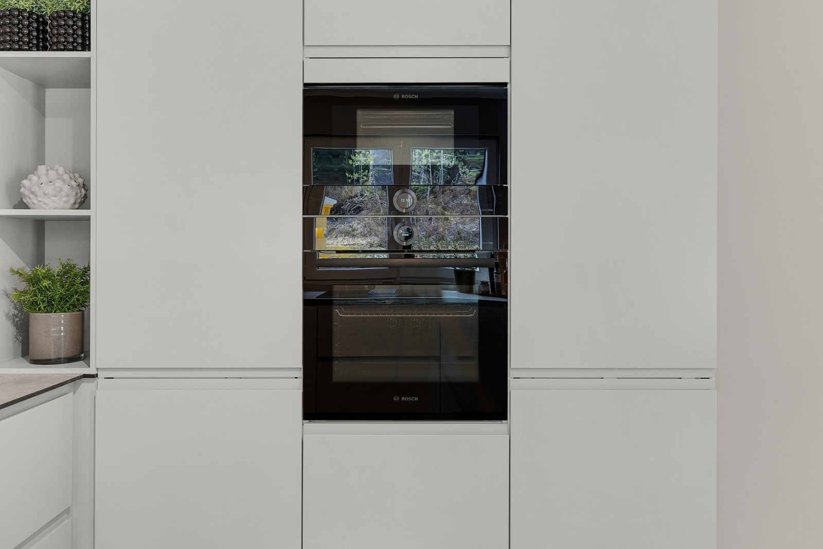 Integrert mikro og stekeovn med pyrolyse, samt praktisk plassbygget hyllenisje. Galleribilde