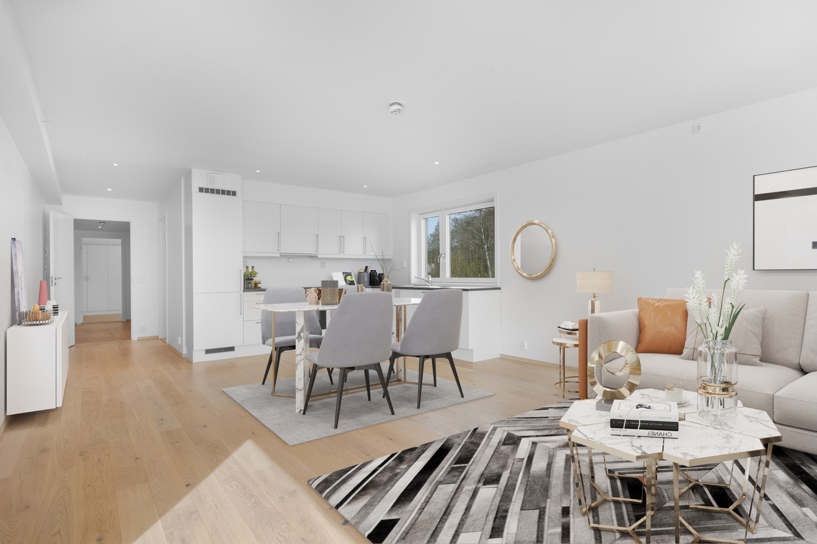 Stuen har en åpen løsning mot kjøkkenet, samt flott takhøyde som gir en meget luftig romfølelse. Oppvarming via fjernvarme tilknyttet vannbåren varme. Bildet er kun digitalt illustrert m/møbler. Galleribilde