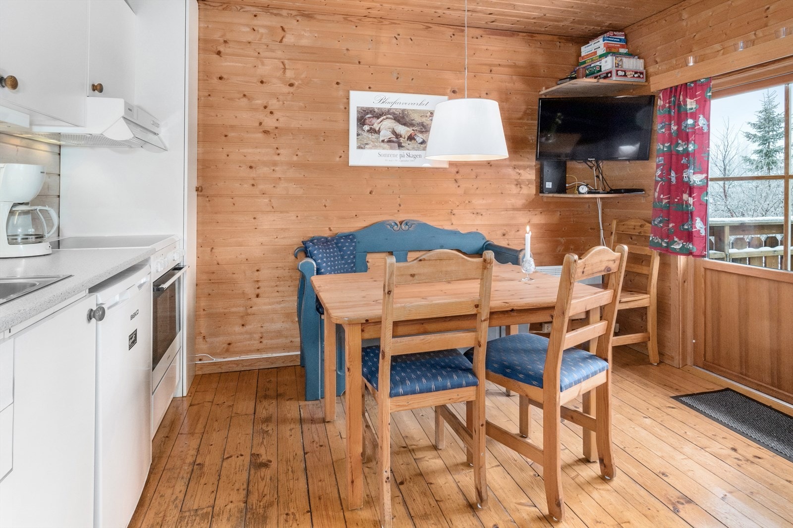 Etter en aktiv dag i fjellet kan det være trivelig å slappe av med ett brettspill ved kjøkkenbordet. Galleribilde