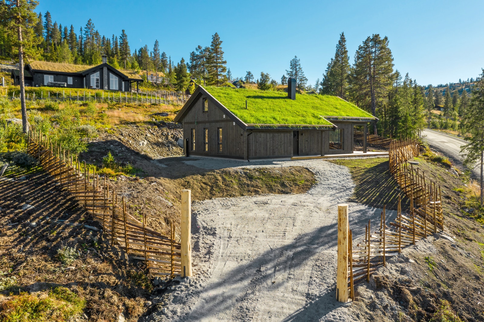 Bilde av Skarvheimhytta på Bøgaset. 1 av 2 modeller som bygges i feltet. Galleribilde
