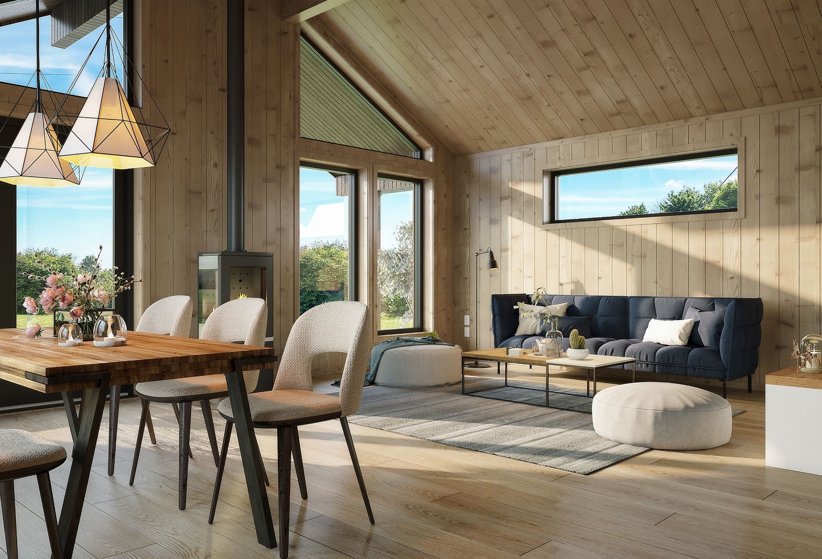 Gjennom stor vinduer slippes det vakre høyfjellslandskapet inn i stua. Galleribilde