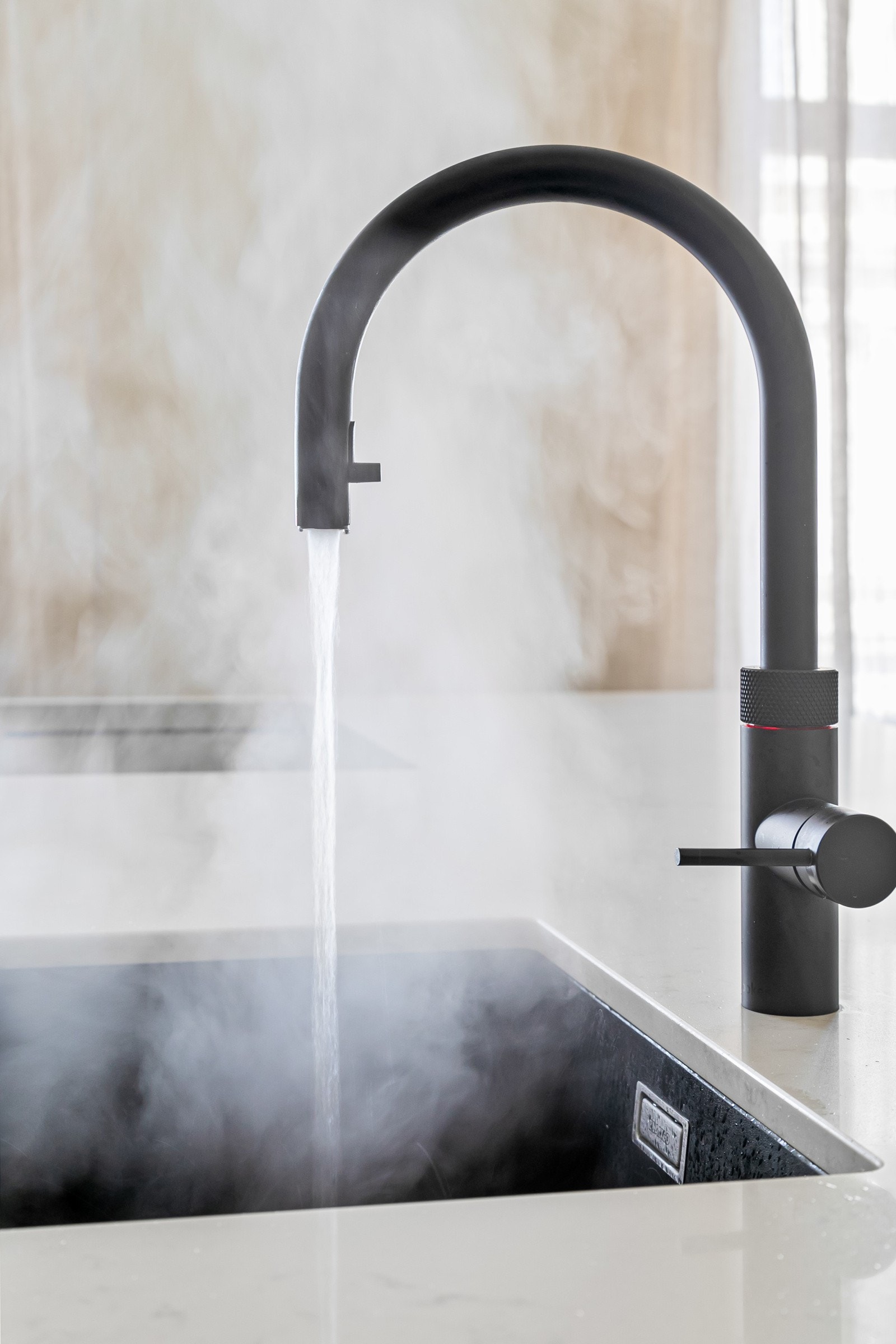 Det er montert quooker i armaturet, en ekstra luksus i hverdagen Galleribilde