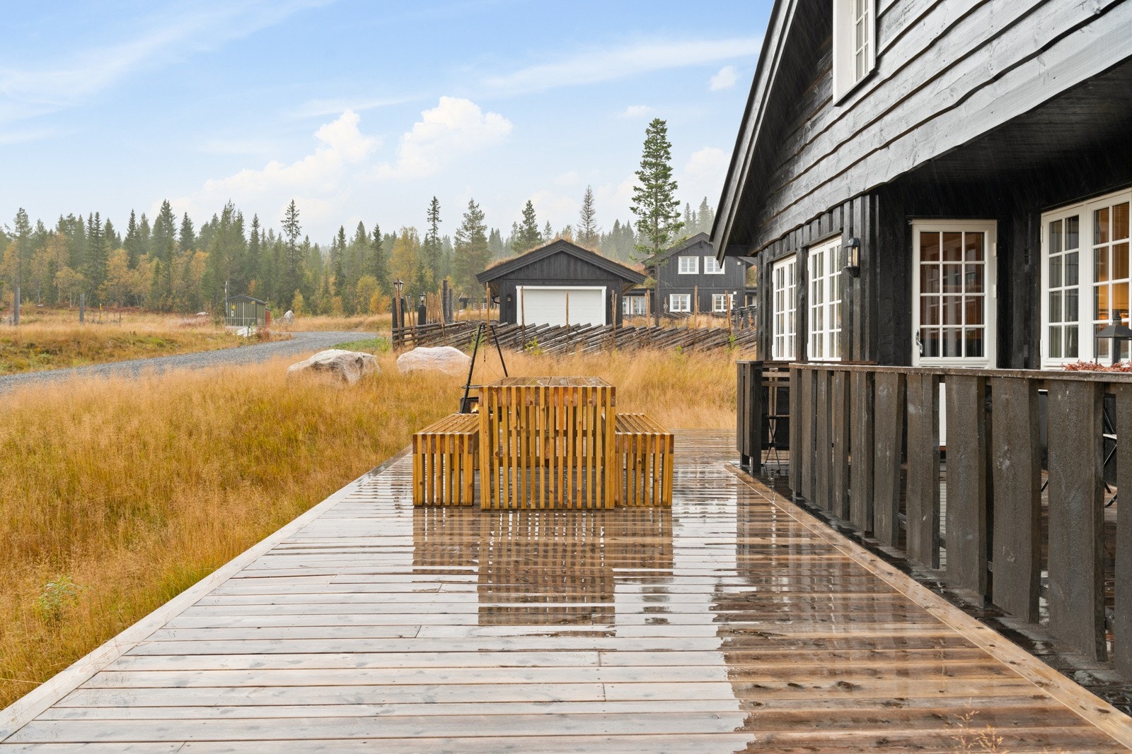 Forlenget terrassen med platting. Galleribilde