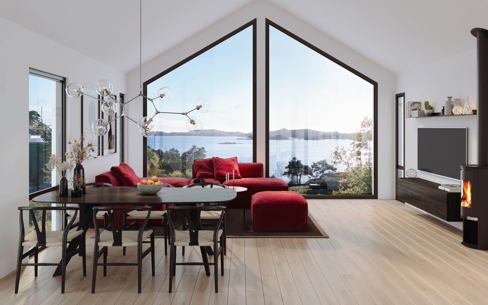 Her har en sjøen inn i stua gjennom de generøse vindusflatene Galleribilde