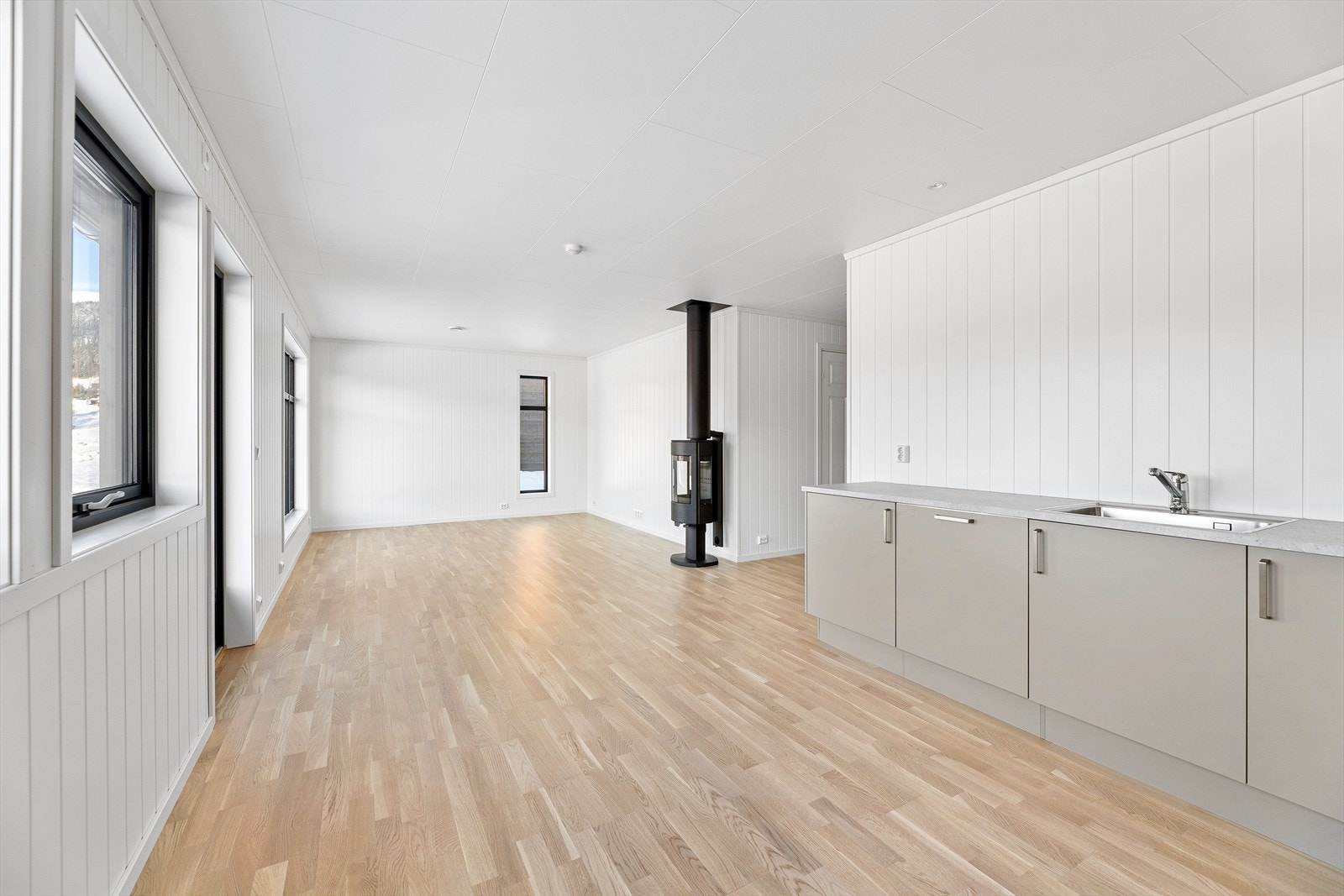 Stemningsfull og varmende peisovn fra Dovre. Galleribilde