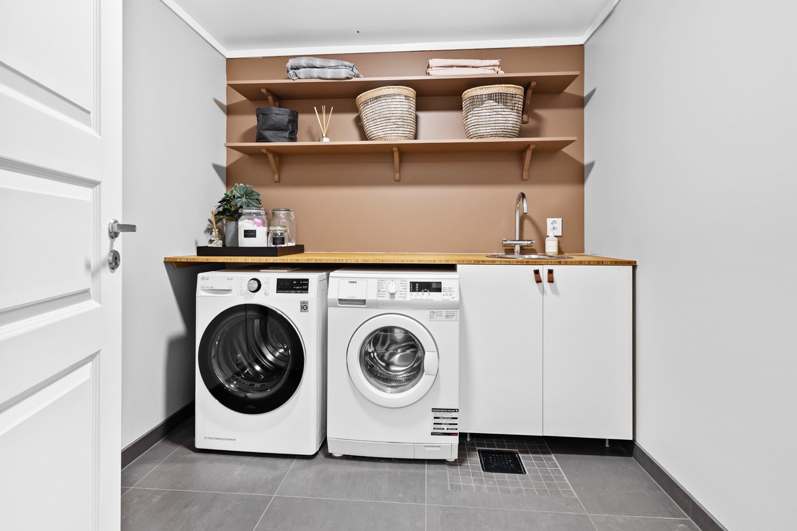 Praktisk vaskerom med gulvvarme Galleribilde