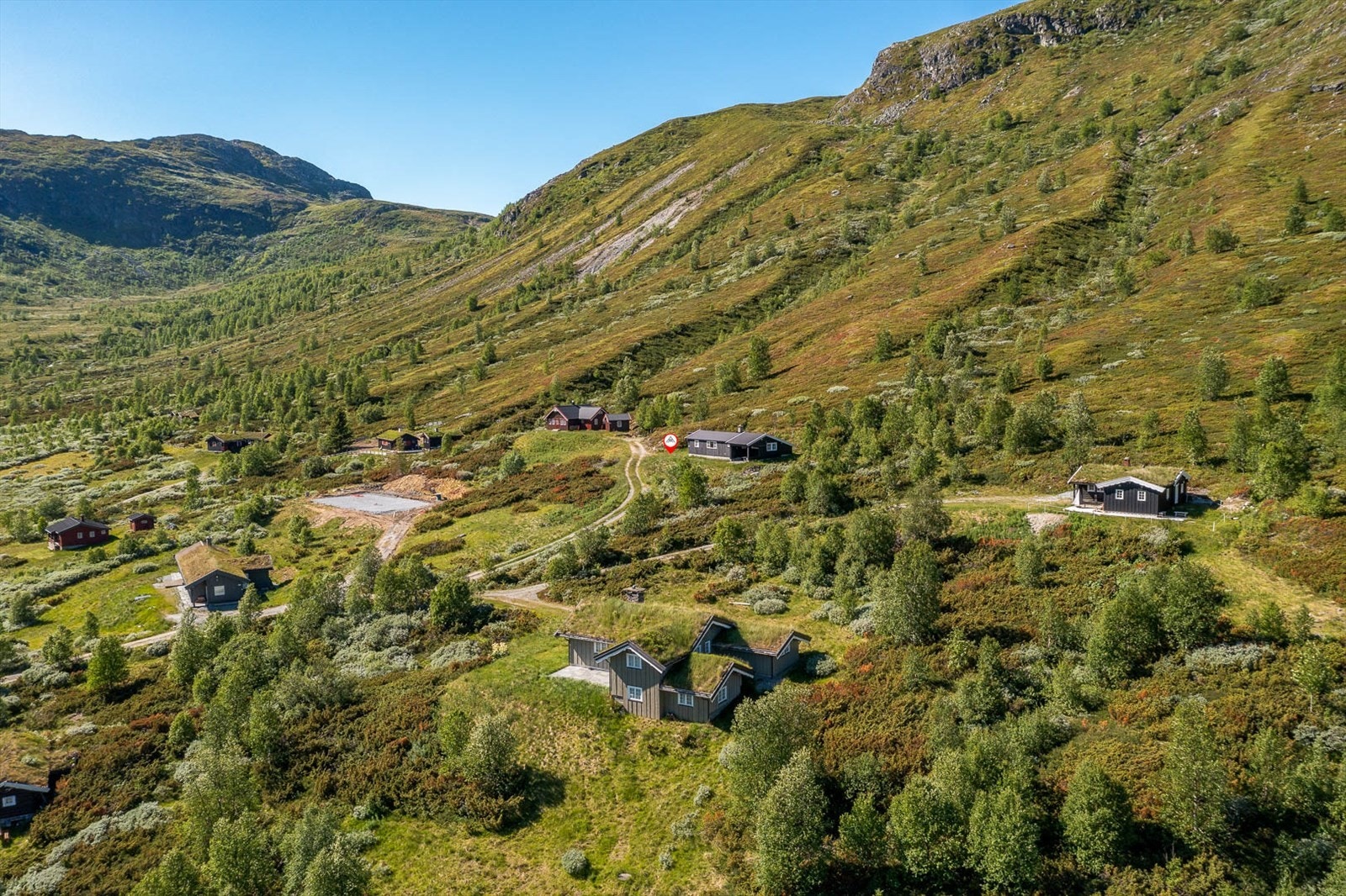 Hytta plassering i fjellet. Galleribilde