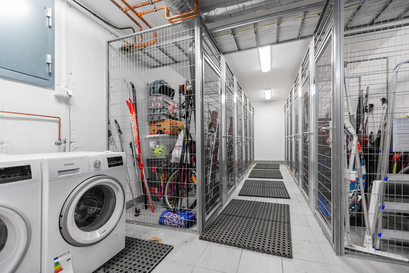 I kjelleren finner man felles bodareal og vaskemaskin/tørketrommel Galleribilde