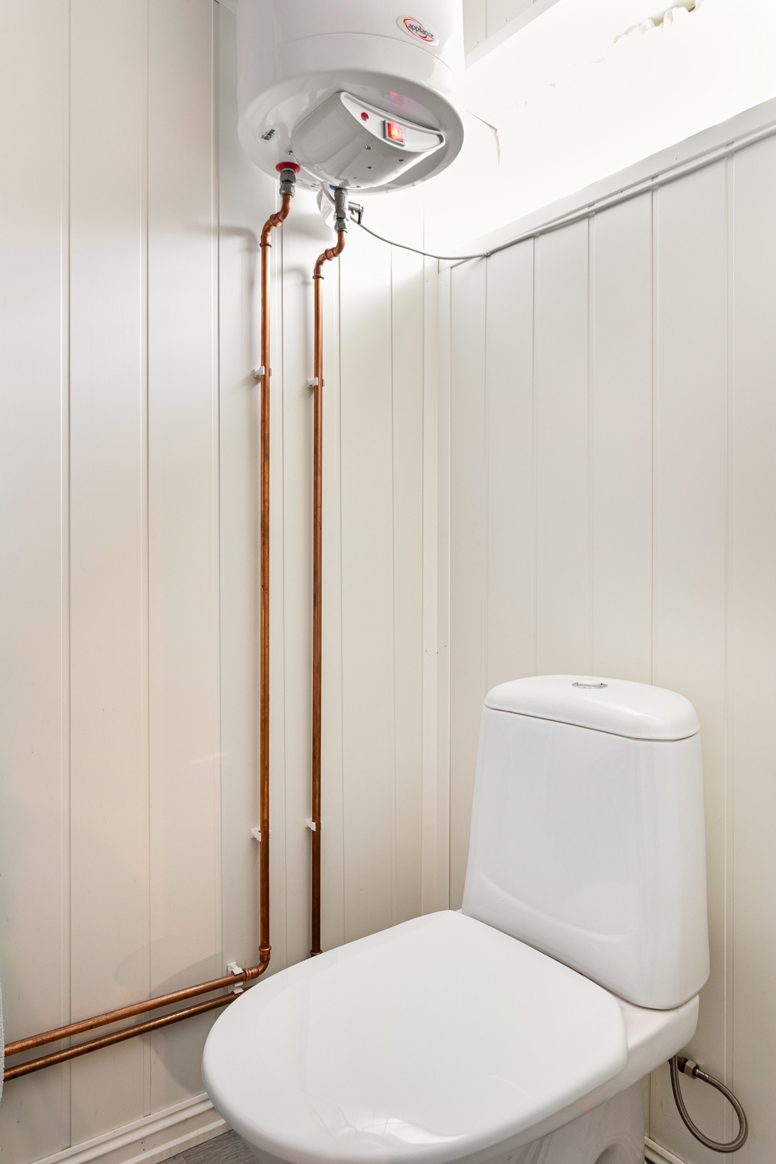 Toalett ved gjesterommet i boenheten. Galleribilde