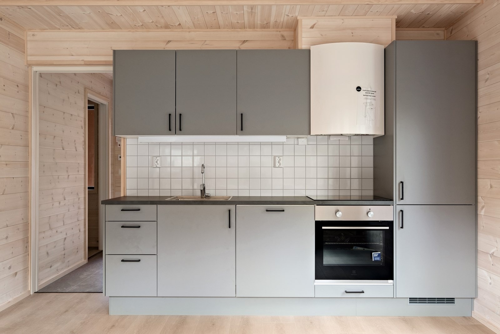 Kjøkken er i en fin og moderne farge. Galleribilde