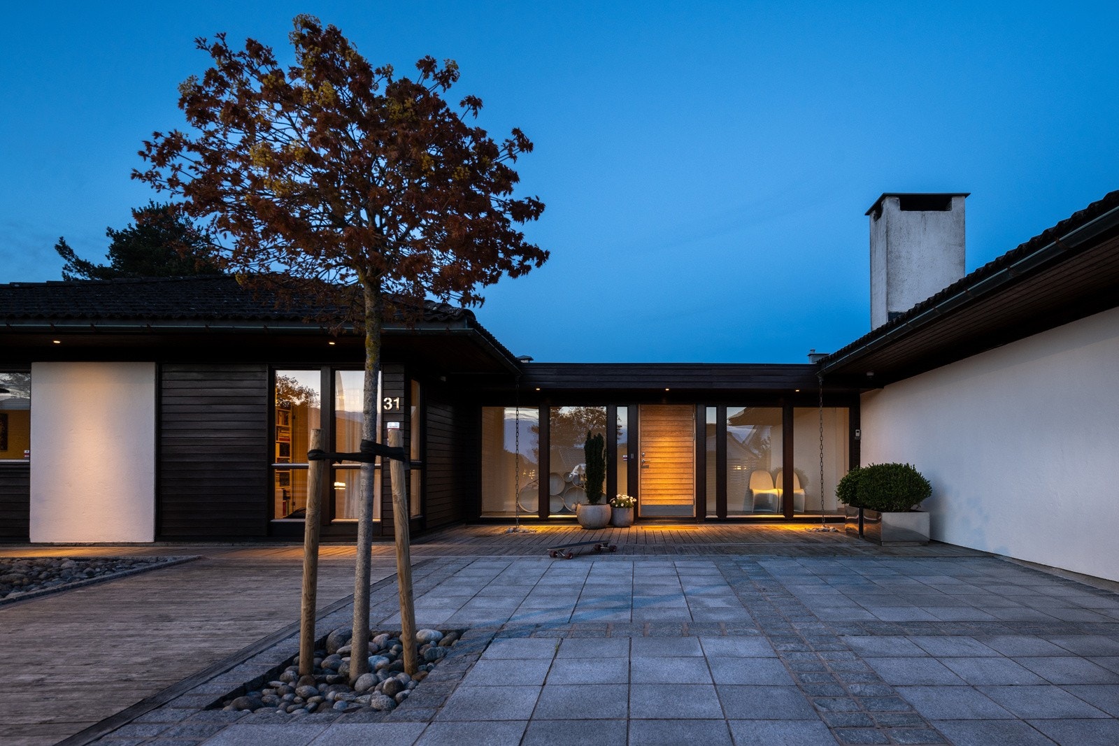 Et tiltalende og elegant inngangsparti som gir en opplevelse av eksklusivitet. Galleribilde