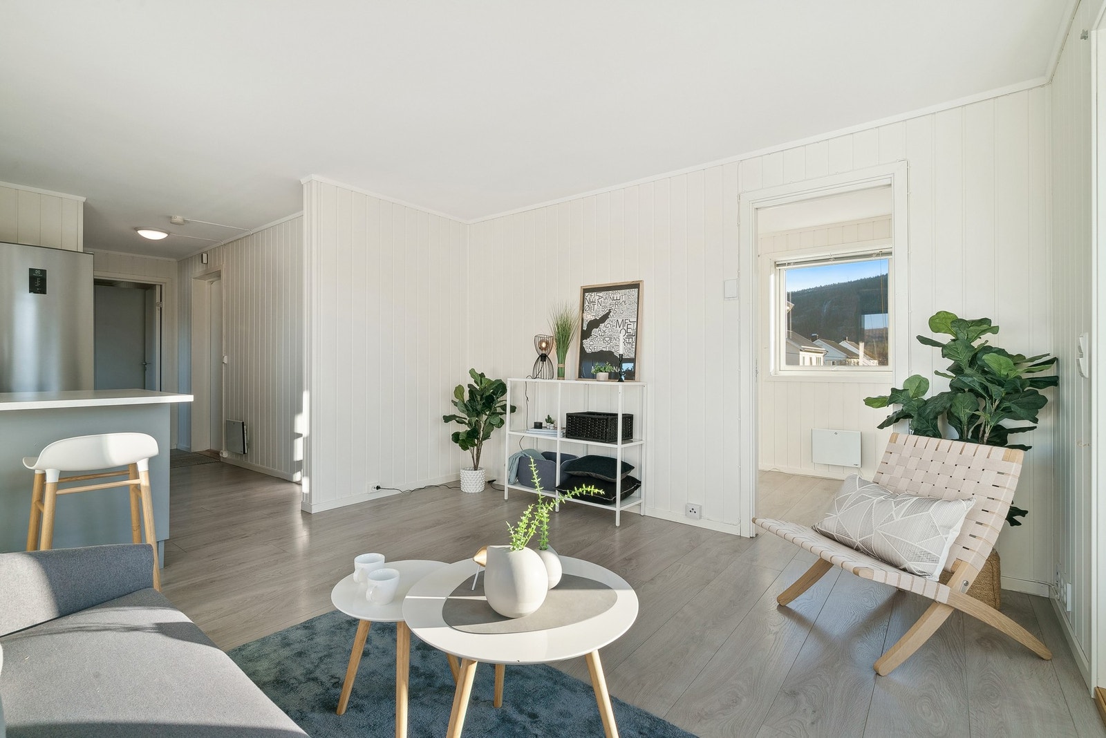 Leiligheten har en lys og fin stue, med gode vindusflater som slipper inn mye naturlig lys. Galleribilde