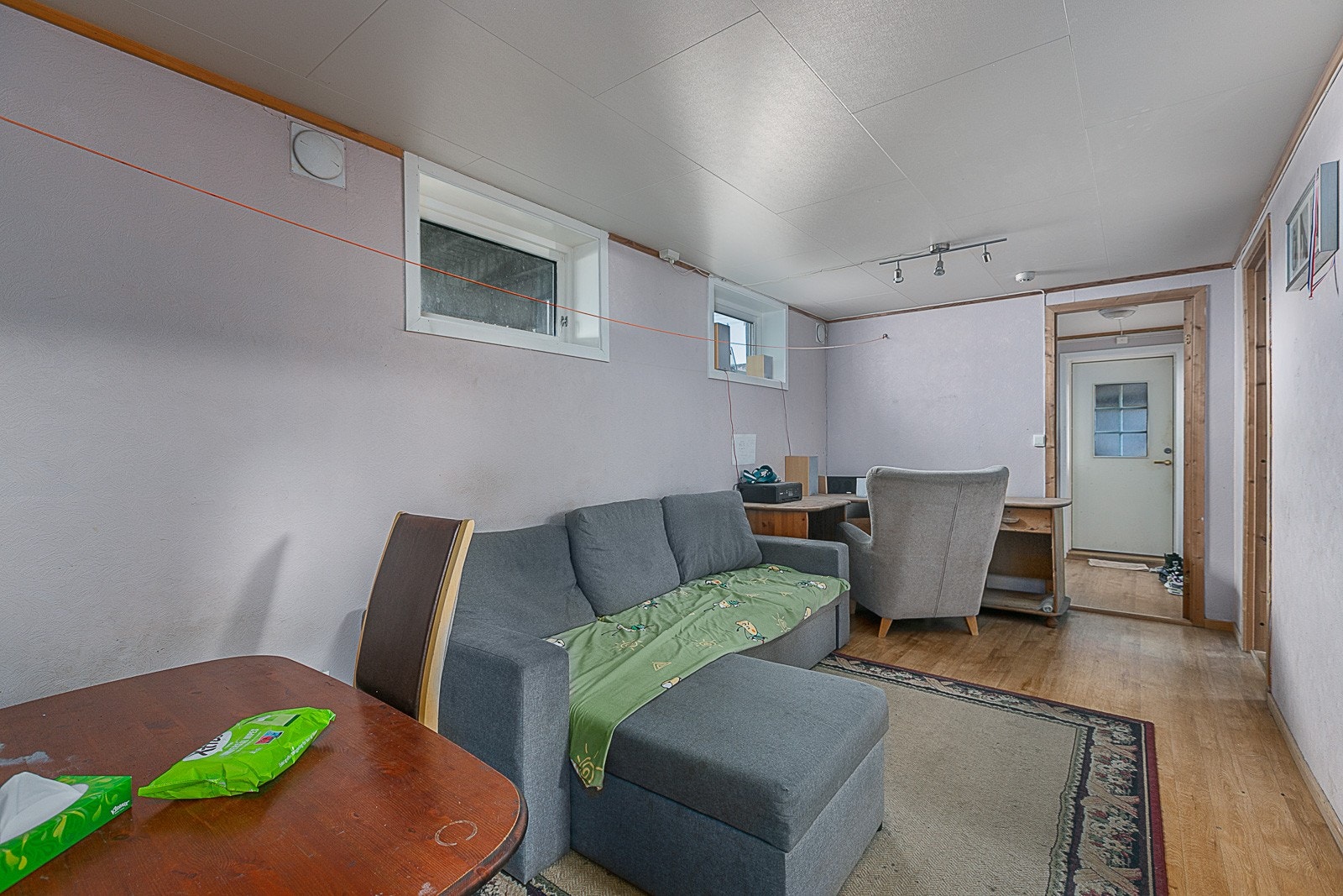 Stue i kjellerleiligheten. Galleribilde