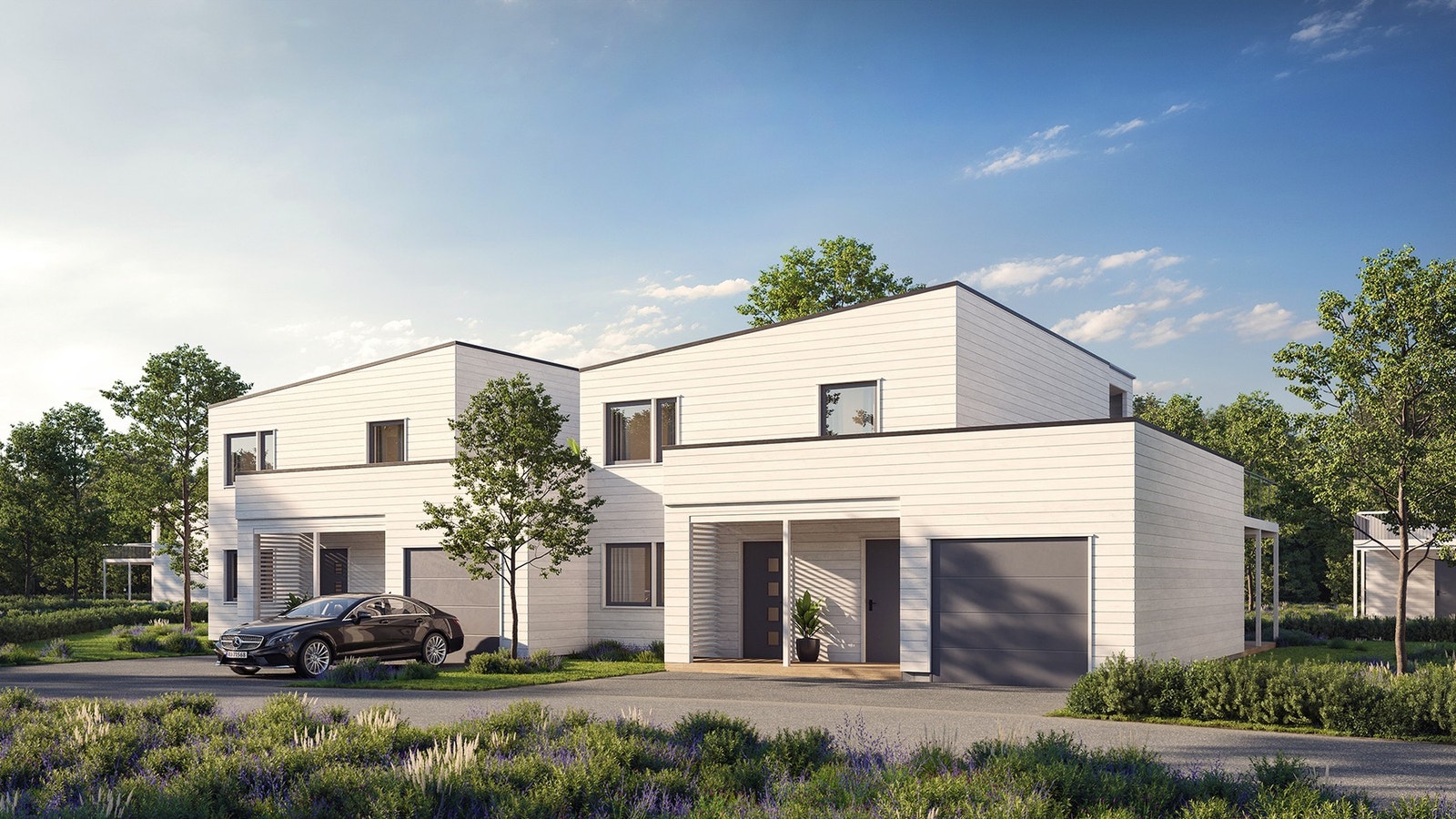 Fasader mot øst - atkomsten til boligen - legg merke til de store terrassene som strekker seg langs hele boligen. Galleribilde