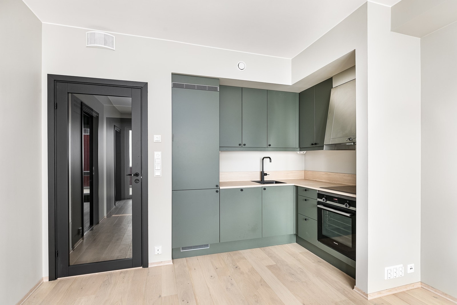 Illustrasjonsfoto fra visningsleilighet med innbydende kjøkkeninnredning fra Sigdal Galleribilde