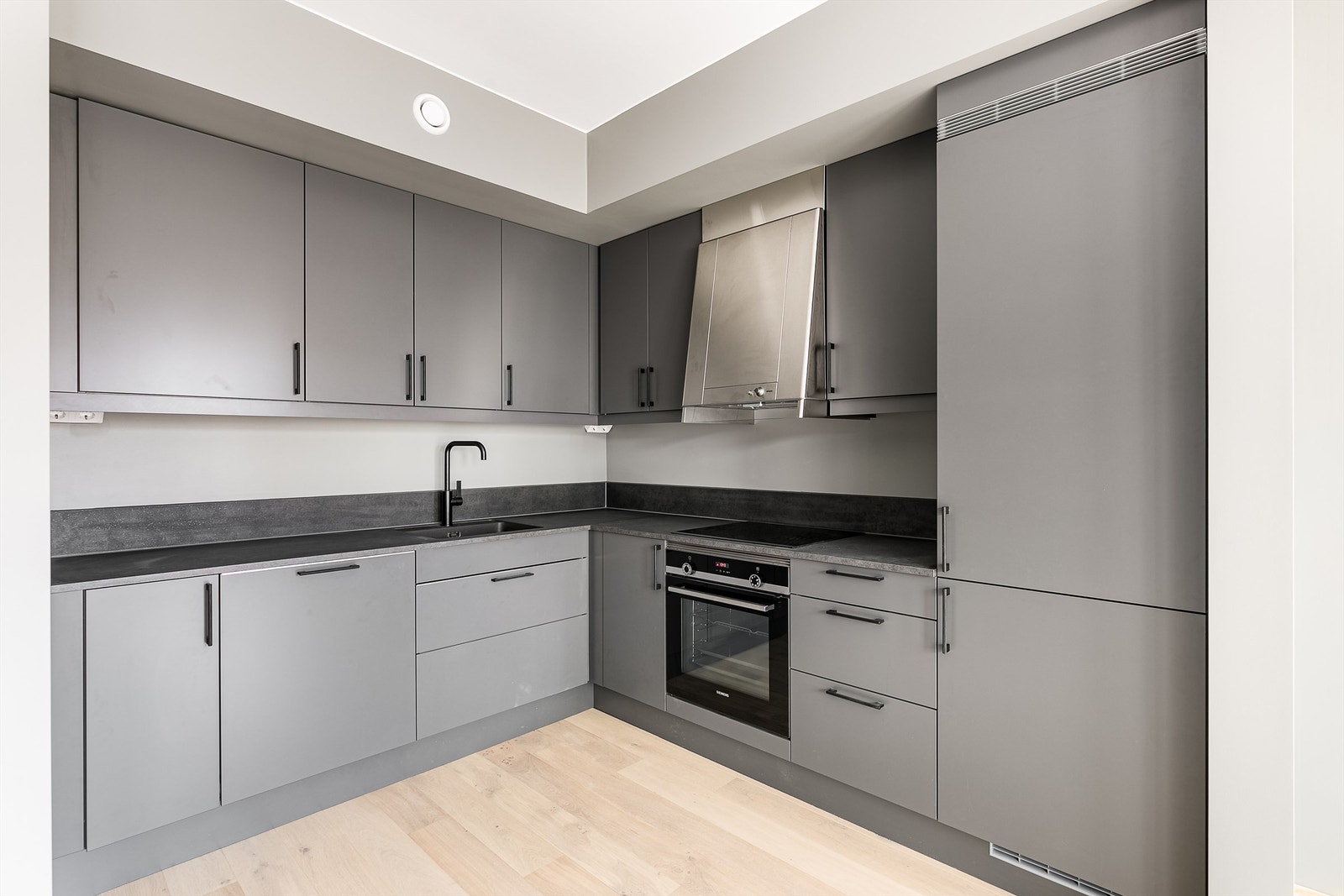 Illustrasjonsfoto fra visningsleilighet med innbydende kjøkkeninnredning fra Sigdal Galleribilde