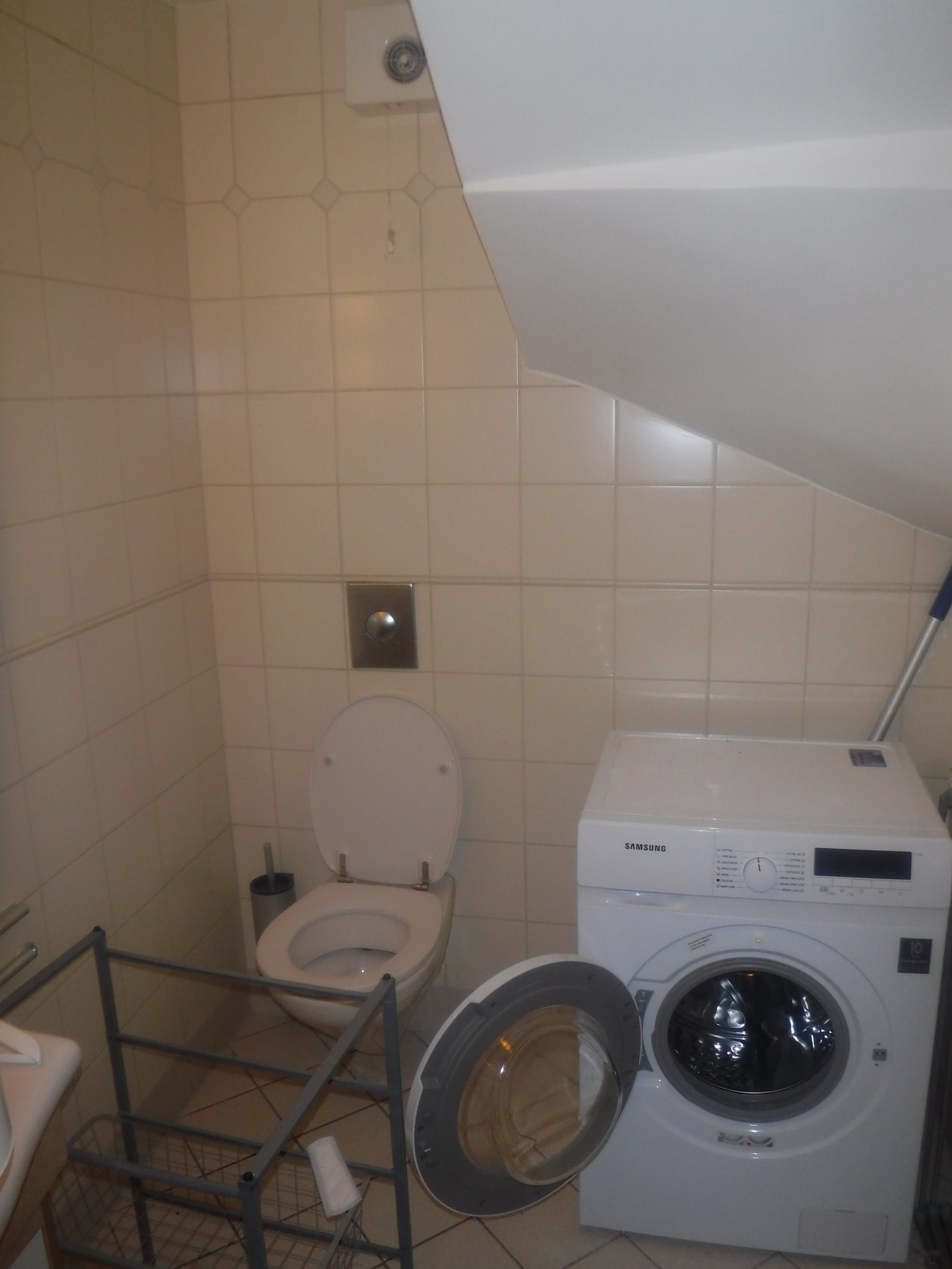 toalett og vaskemaskin Galleribilde