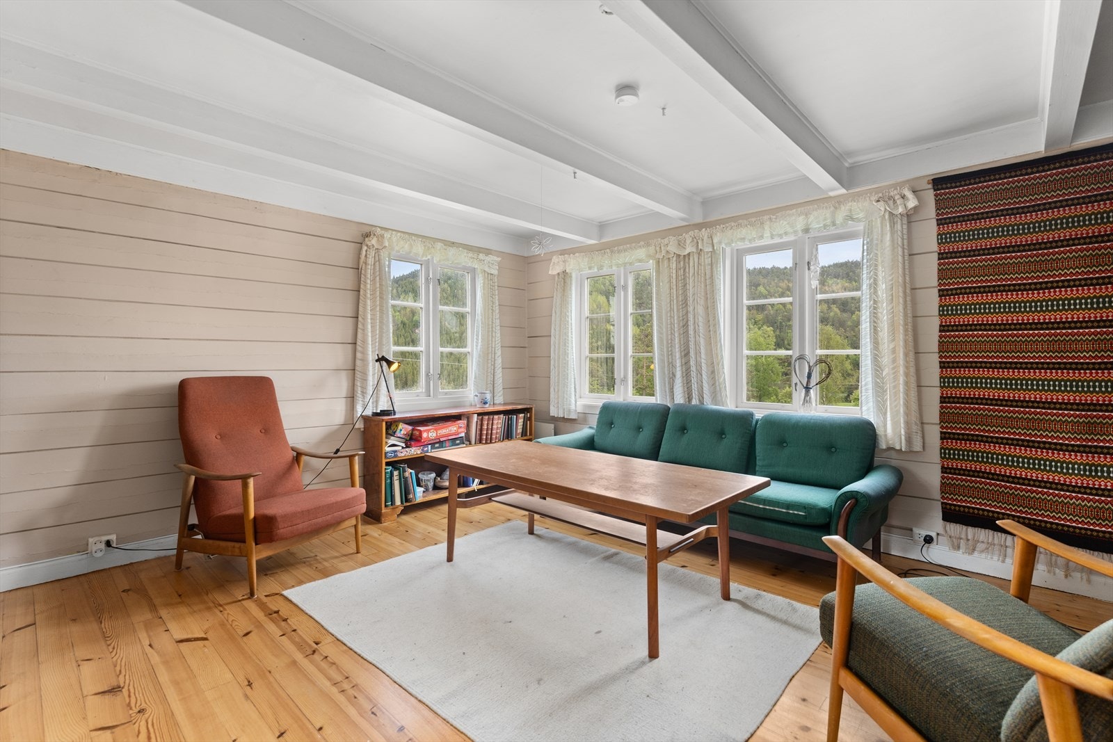 De fine detaljene med stokkeveggene er beholdt i flere av rommene Galleribilde