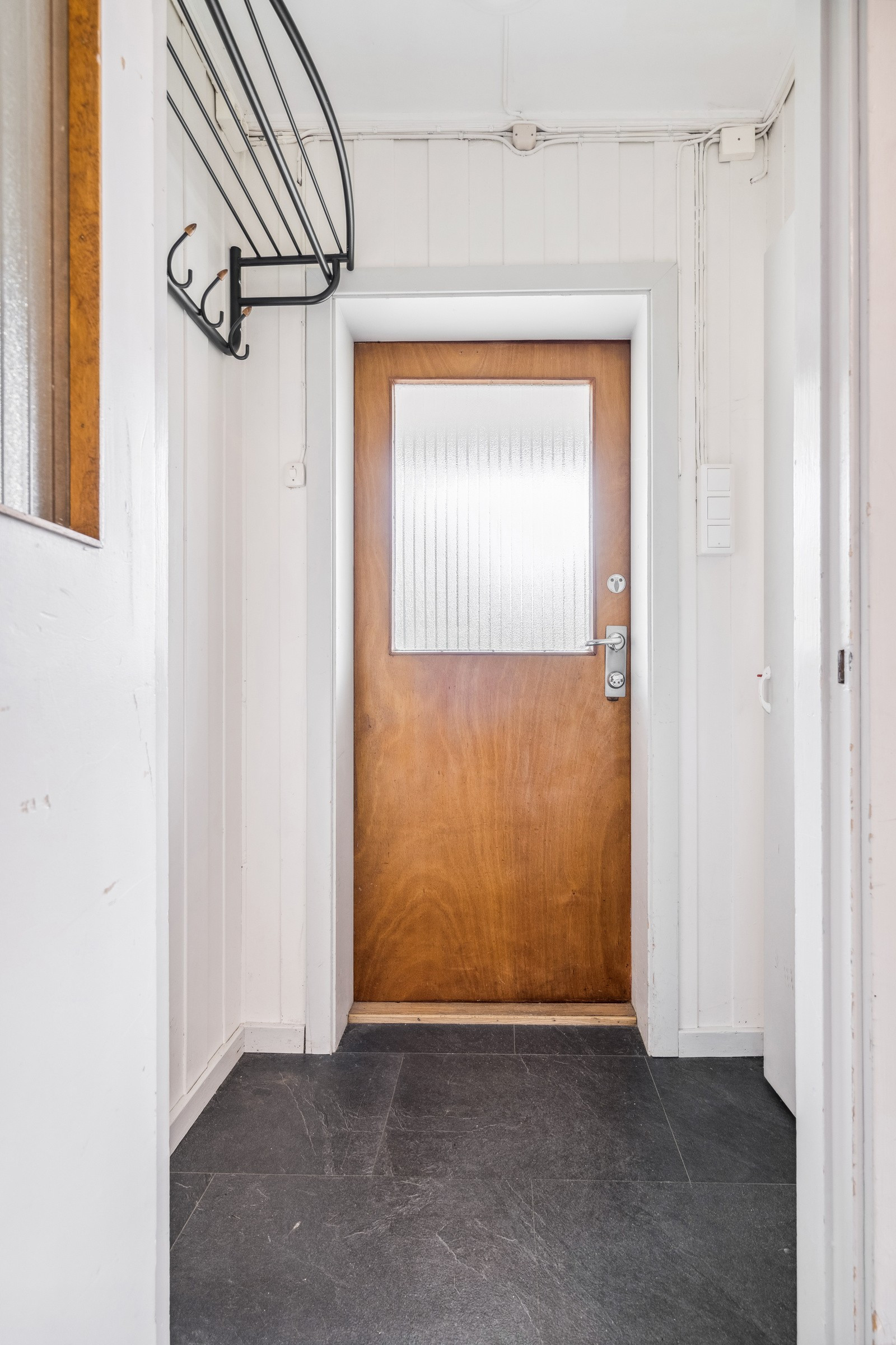 Velkommen inn i gangen, her kan du henge fra deg yttertøyet.