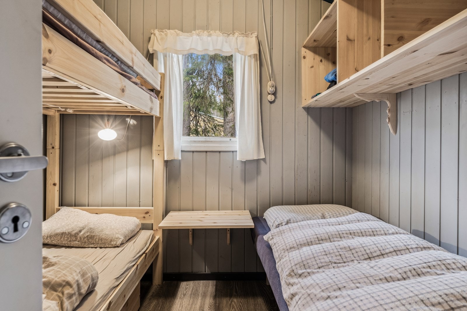 Soverom innredet med flere sengeplasser. Galleribilde