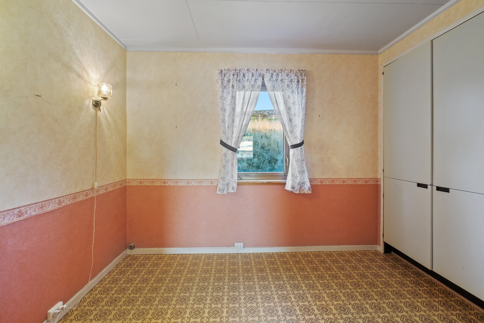 Det andre soverommet er nærliggende kjøkkenet og har vindu mot øst. Galleribilde