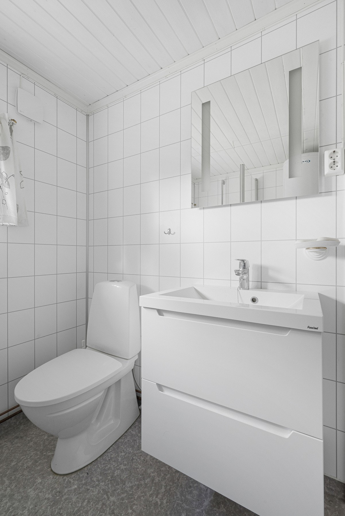 Rommet har opplegg til vaskemaskin. Galleribilde