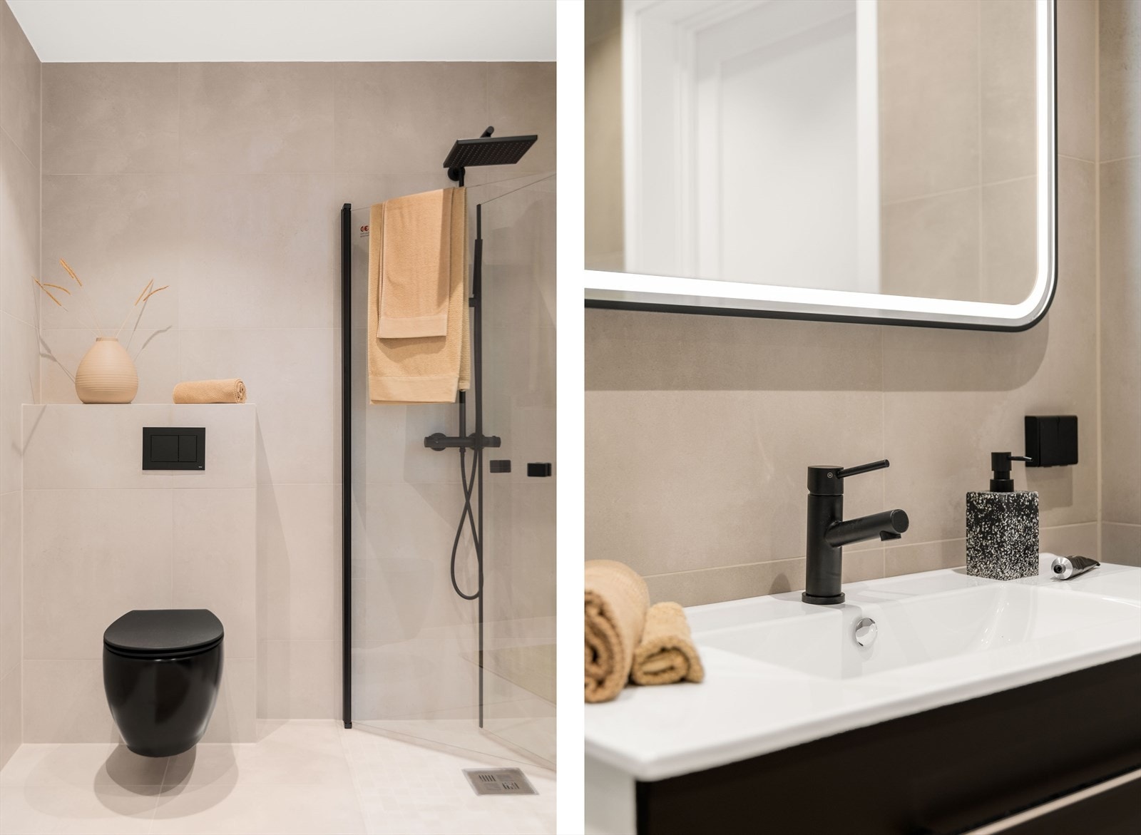 Stilren baderomsinnredning med sorte detaljer og vegghengt WC Galleribilde