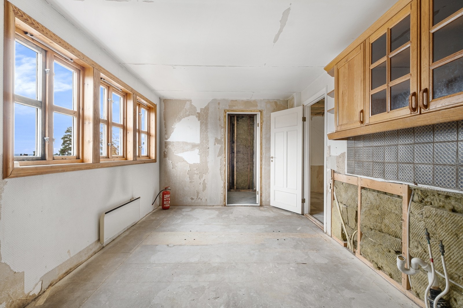 Kjøkkenet ligger i dag separat og har kun noen overskap på veggene. Galleribilde