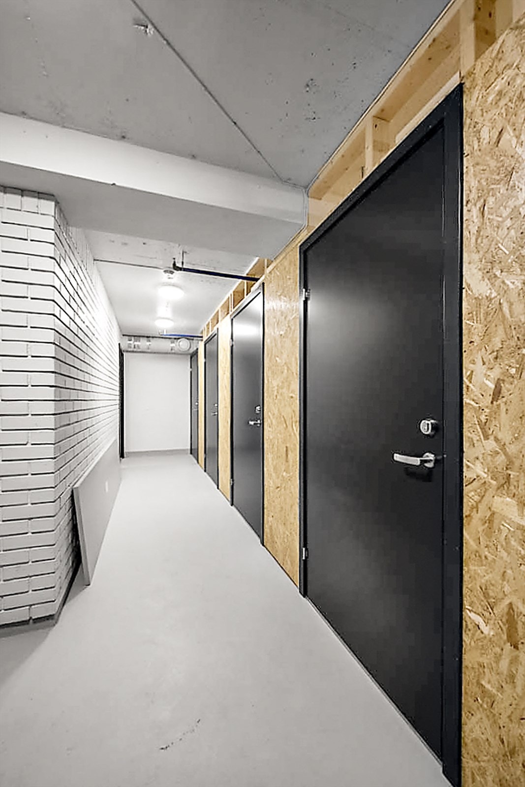 Med leiligheten får du en bod i lukket bodavdeling, samt egen parkeringsplass i parkeringskjeller. Galleribilde