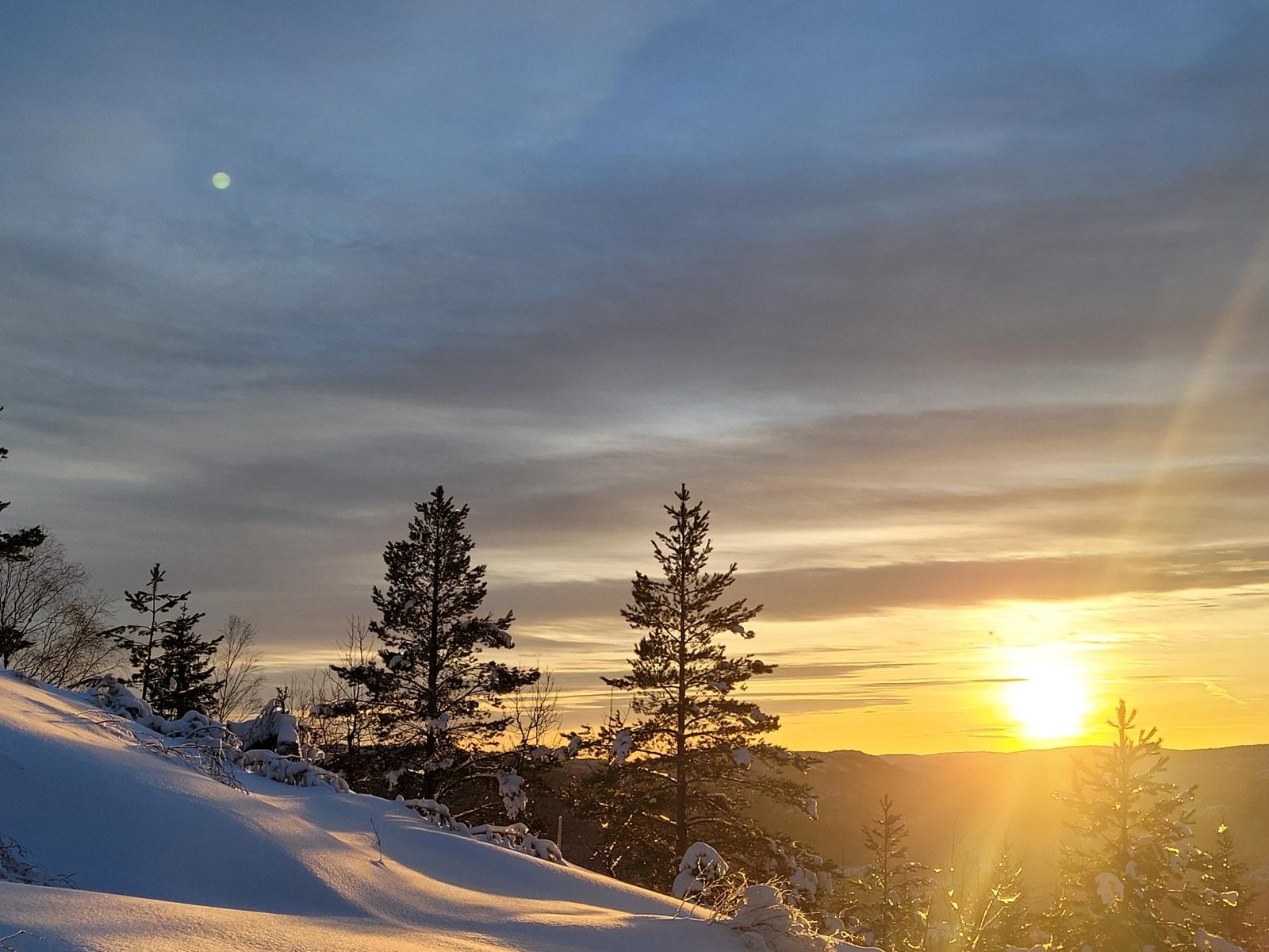 Solnedgang sett fra terrasse desember. Galleribilde