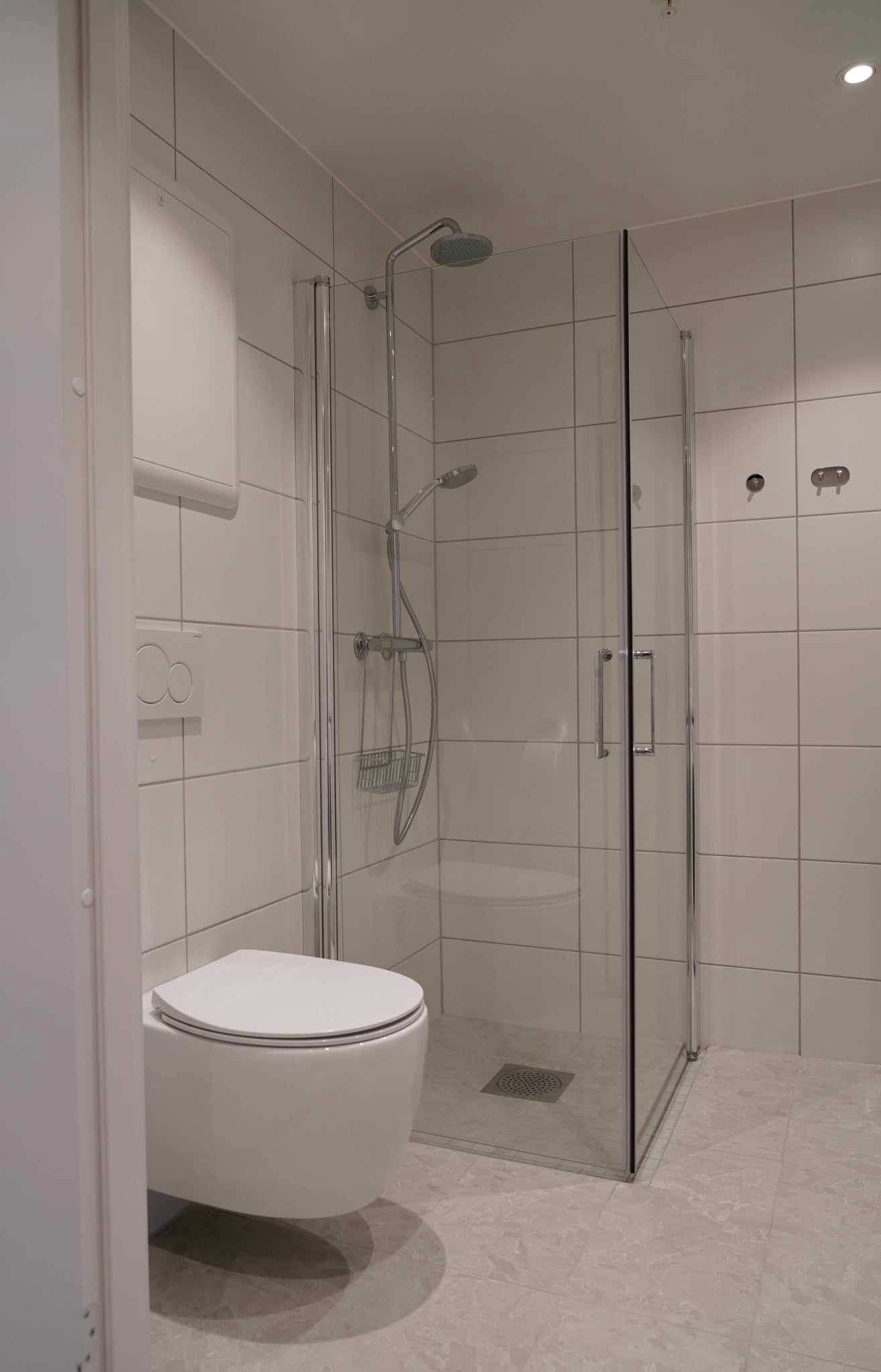 Flislagt bad med gulvvarme. Galleribilde