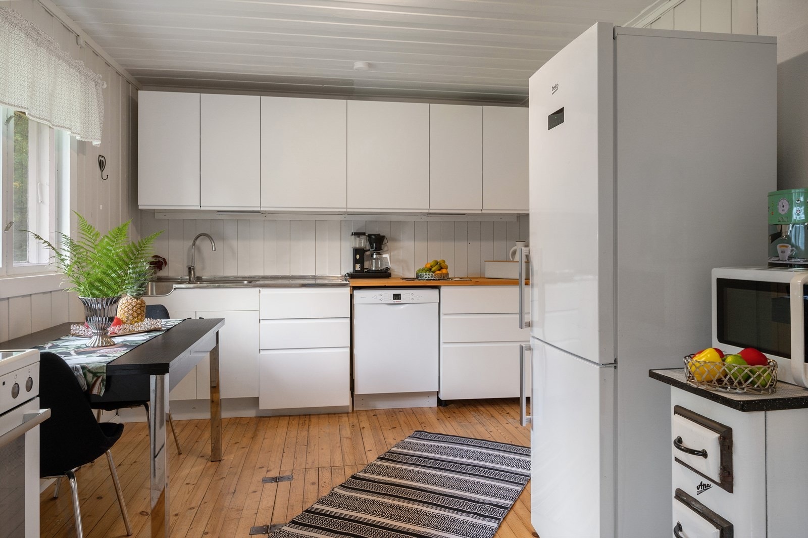 Kjøleskapet følger med handelen. Galleribilde