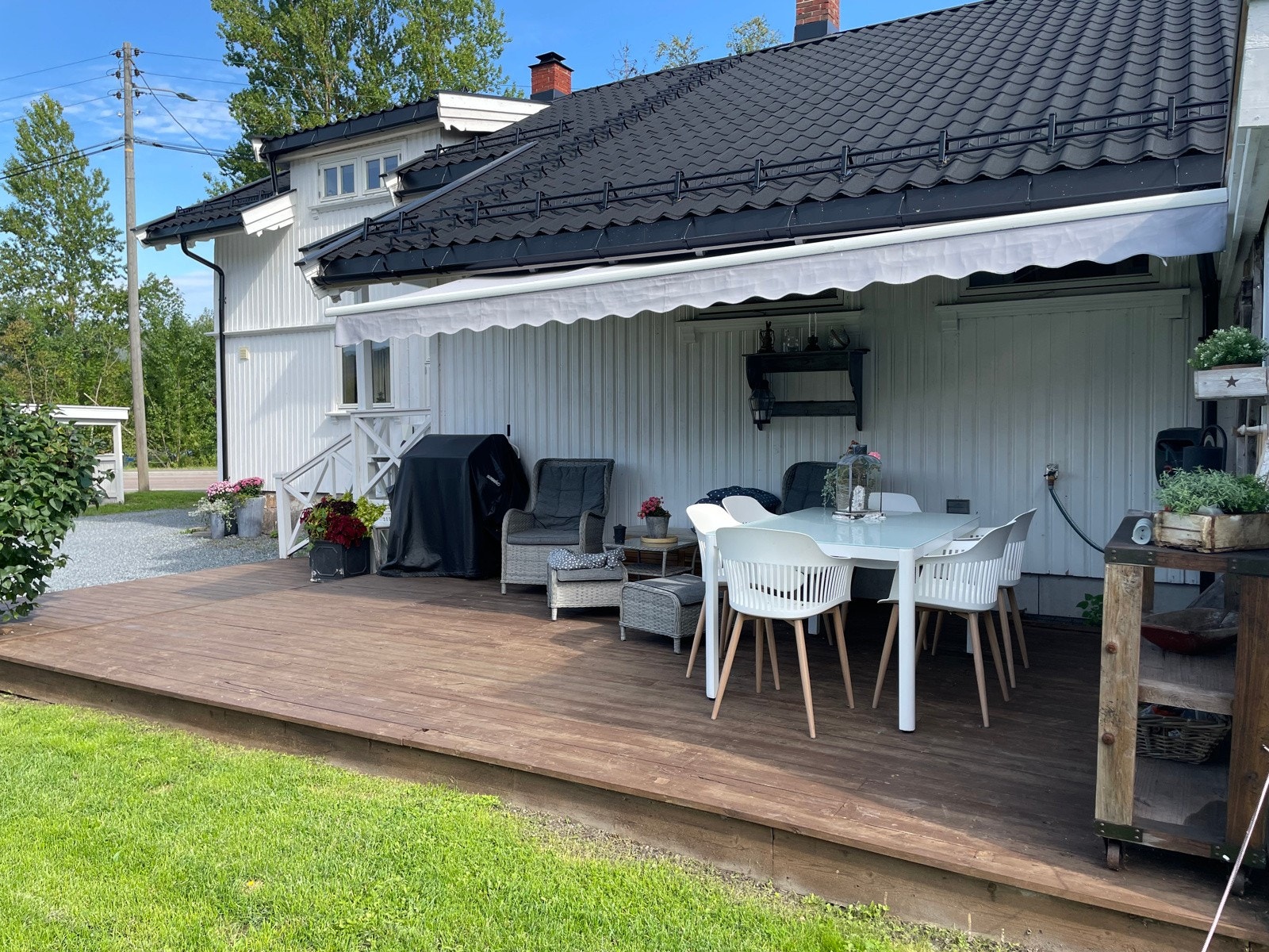 Terrassen har markise Galleribilde