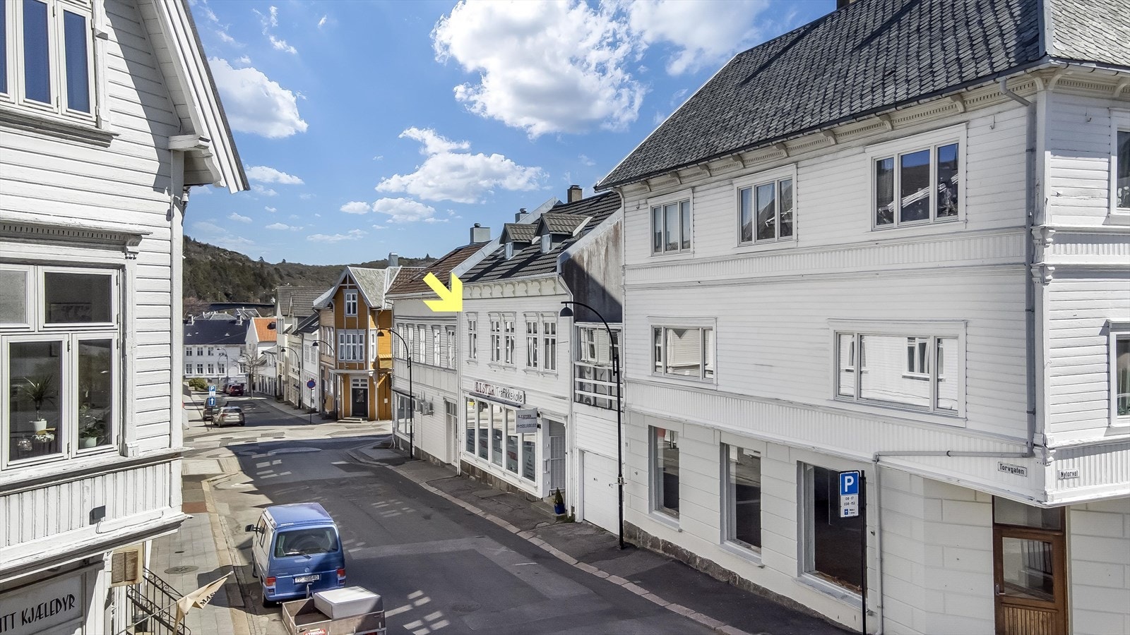 Handelsgate med bakeri og nisjebutikker. Galleribilde
