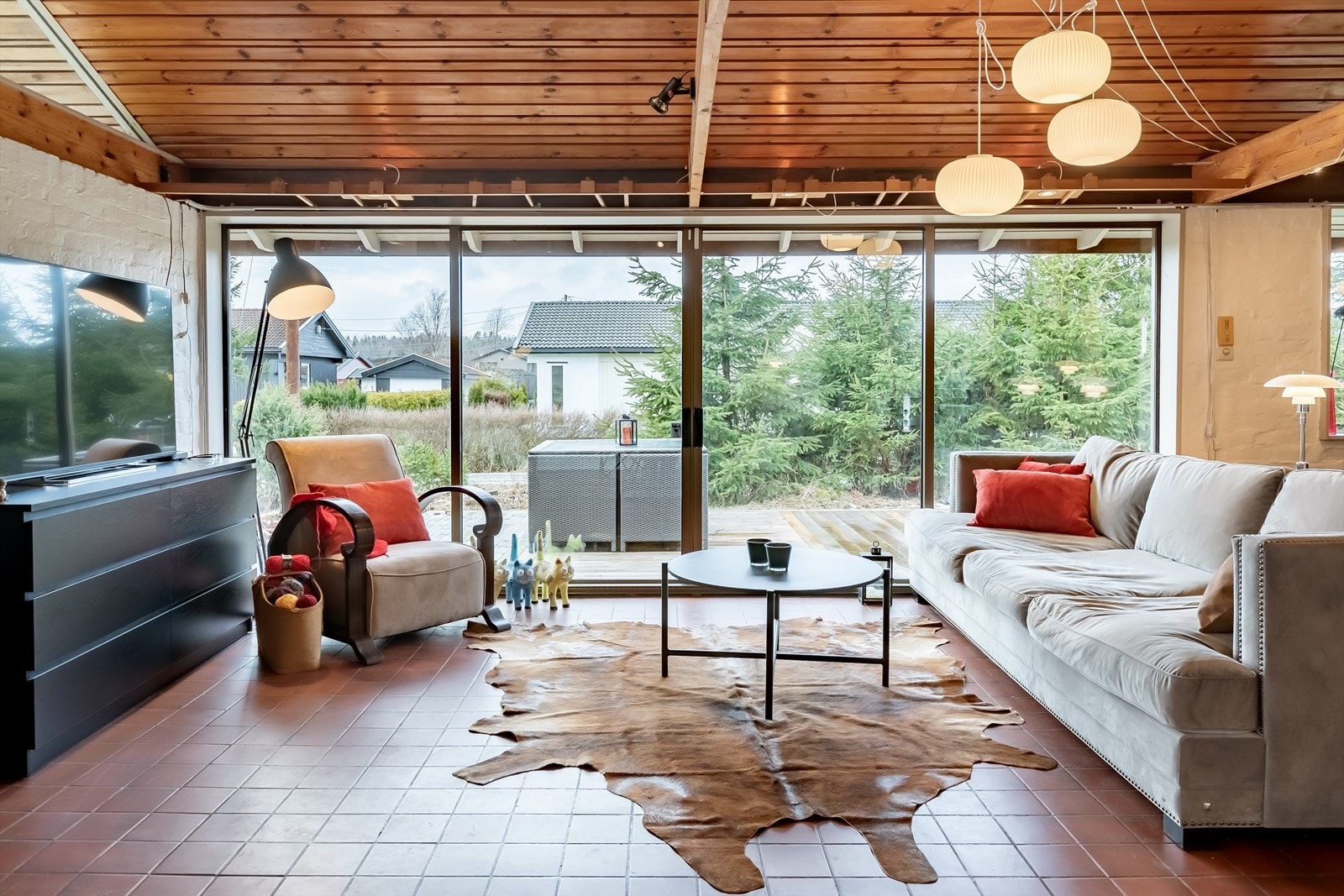 Om du åpner skyvedørene her vil ute- og inneområder ha en glidende overgang Galleribilde