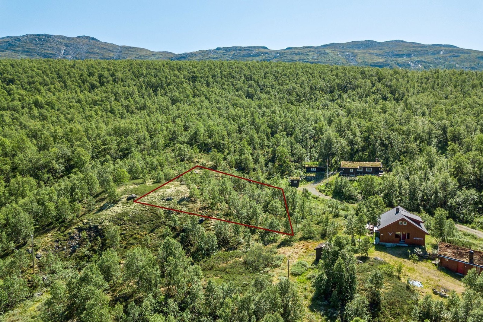 Tomten har en fin beliggenhet i terrenget. Galleribilde