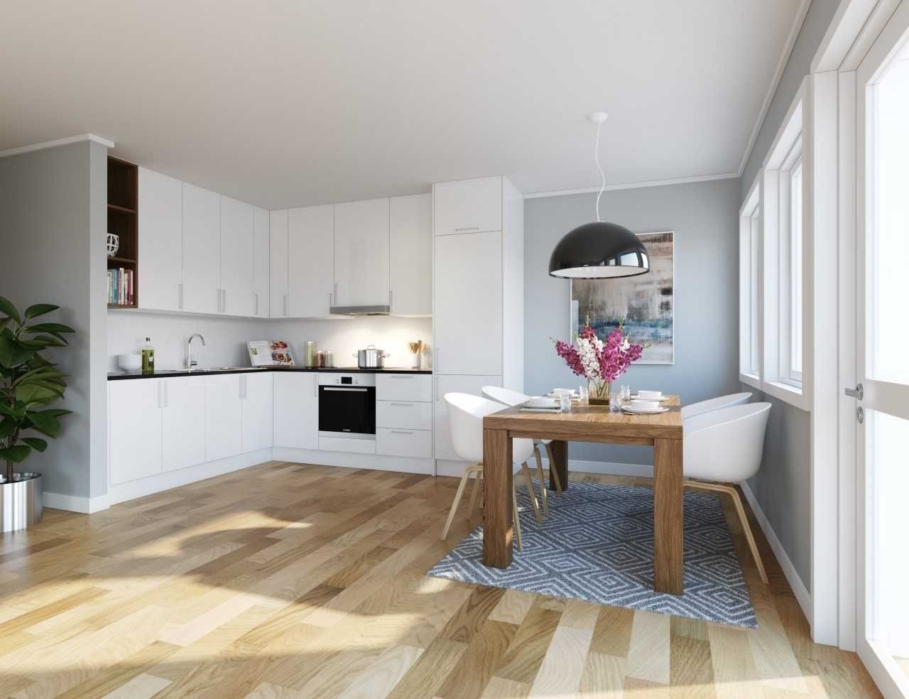 Illustrert bilde. Lyst og åpent kjøkken med trivelig spiseplass Galleribilde