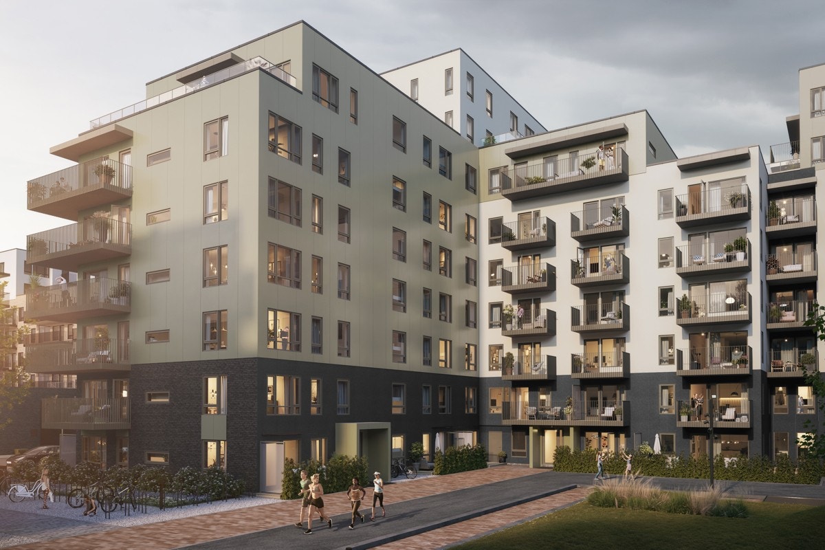 Her ser vi Hus A fra bakgården. Ulike etasjehøyder og delikate farger i fasadematerialene Galleribilde