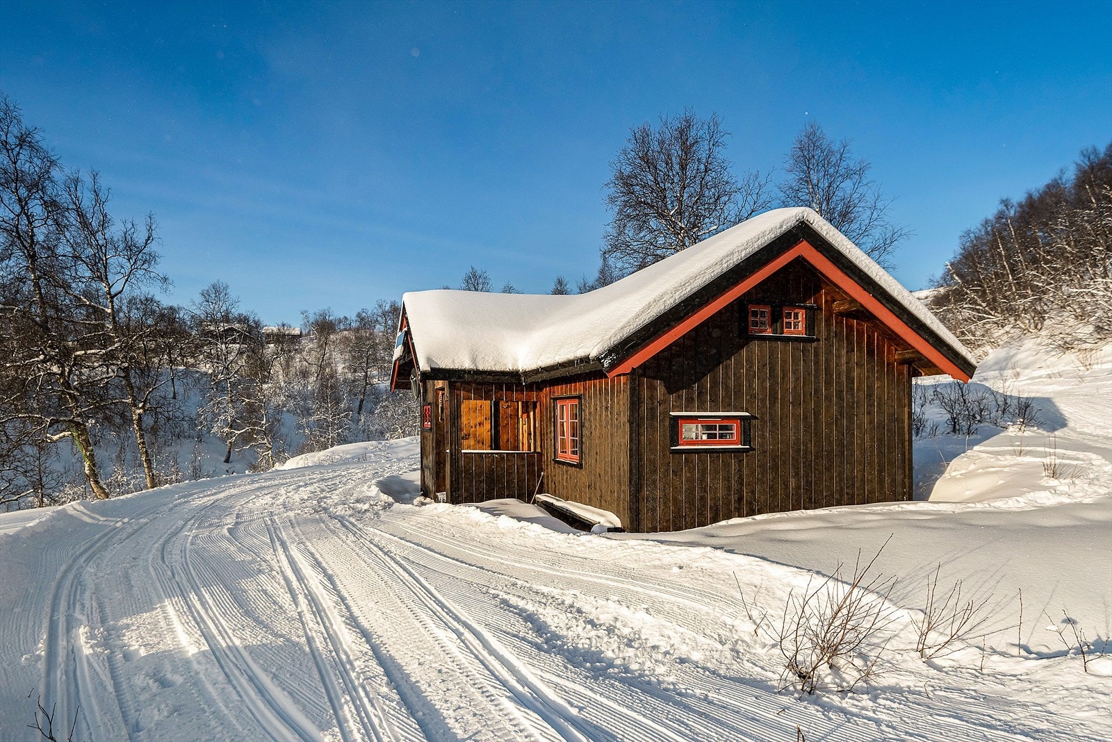 Hytta består av en eldre del og en nyere påbygget del Galleribilde