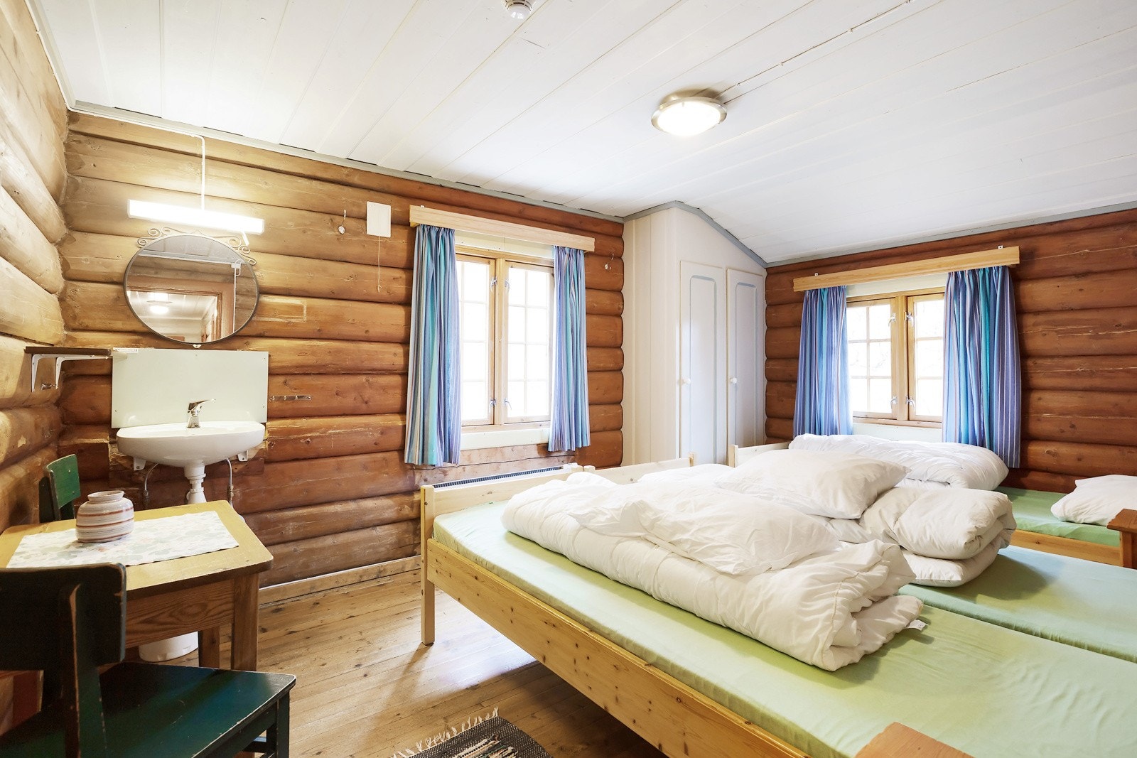 Det er 11 ulike gjesterom som til sammen har 48 sengeplasser Galleribilde