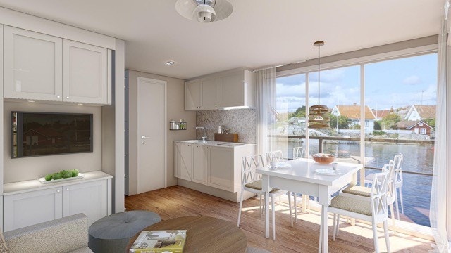 Stue med spiseplass og kjøkken. Galleribilde