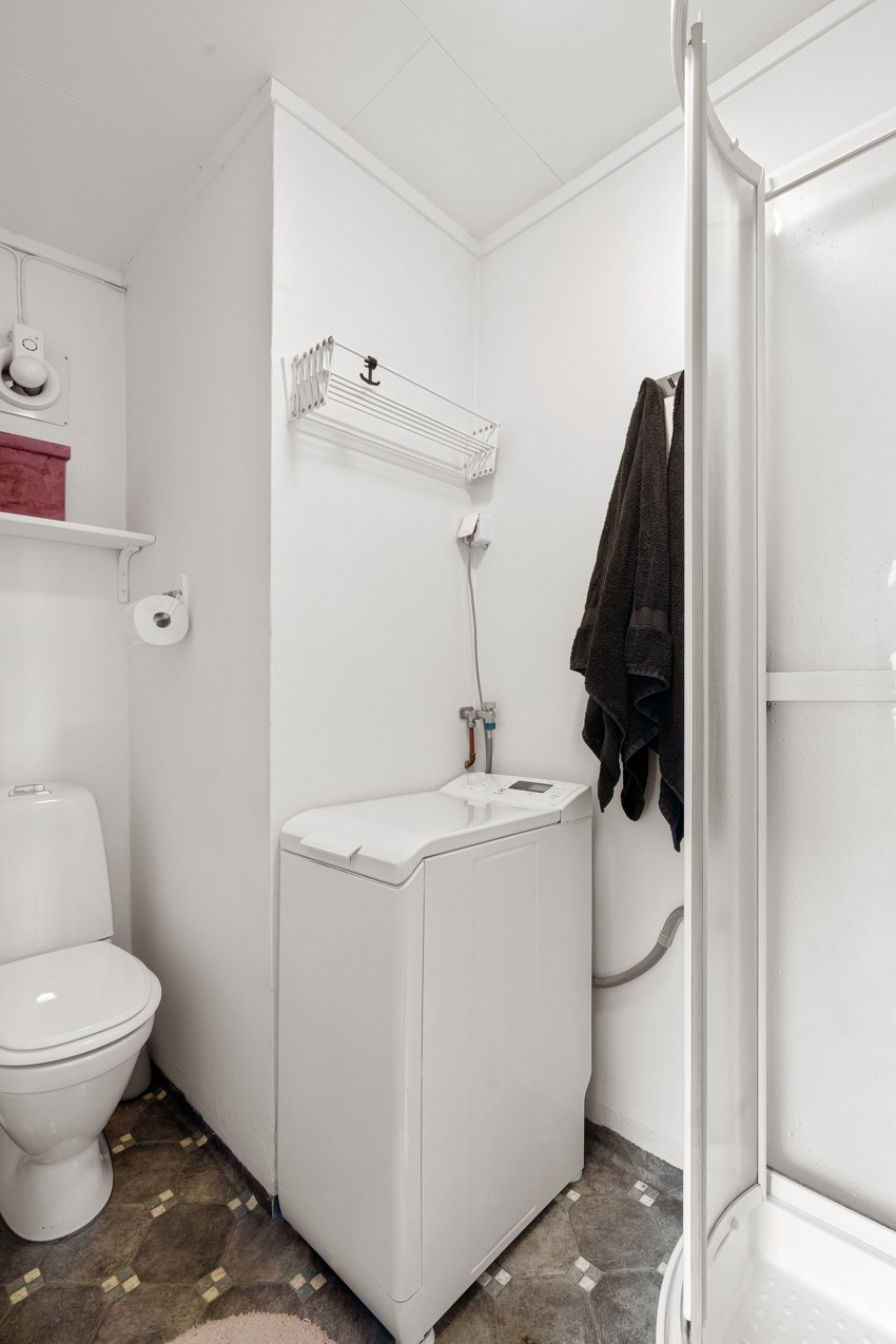Baderom med vaskemaskin