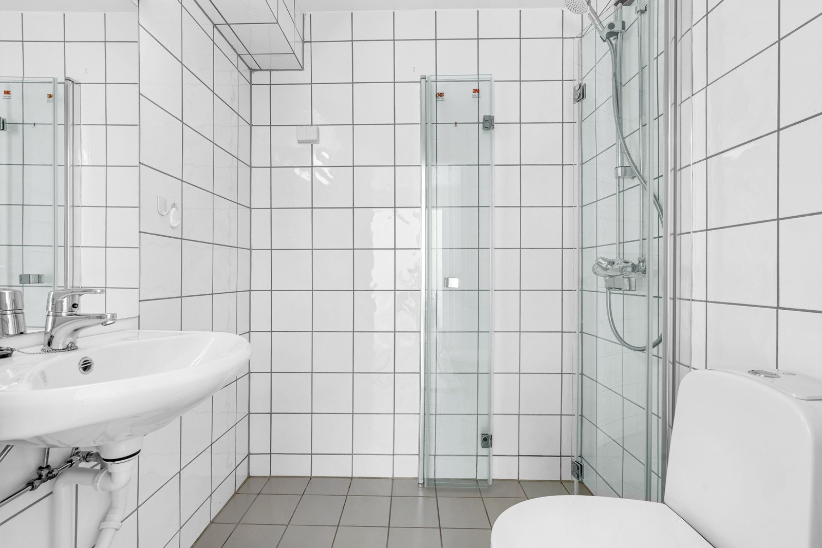 Flislagt bad rehabilitert i regi av borettslaget i 2005. Galleribilde