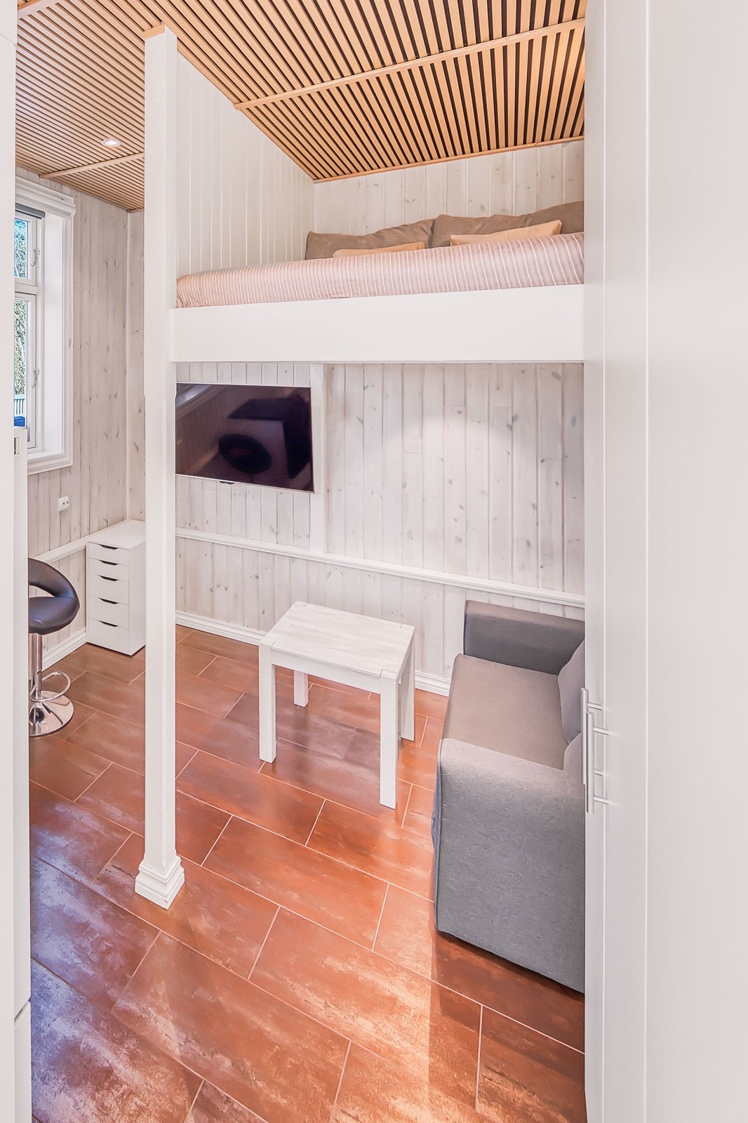 Stigen til hems kan flyttes når den ikke er i bruk. Galleribilde