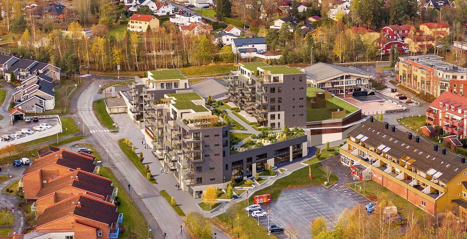 Leiligheten ligger i selveierbygget til venstre ut mot gaten. Galleribilde