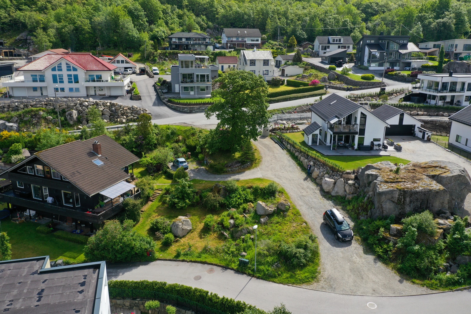 Hva med å sette drømmehuset på tomten midt i bildet? Galleribilde