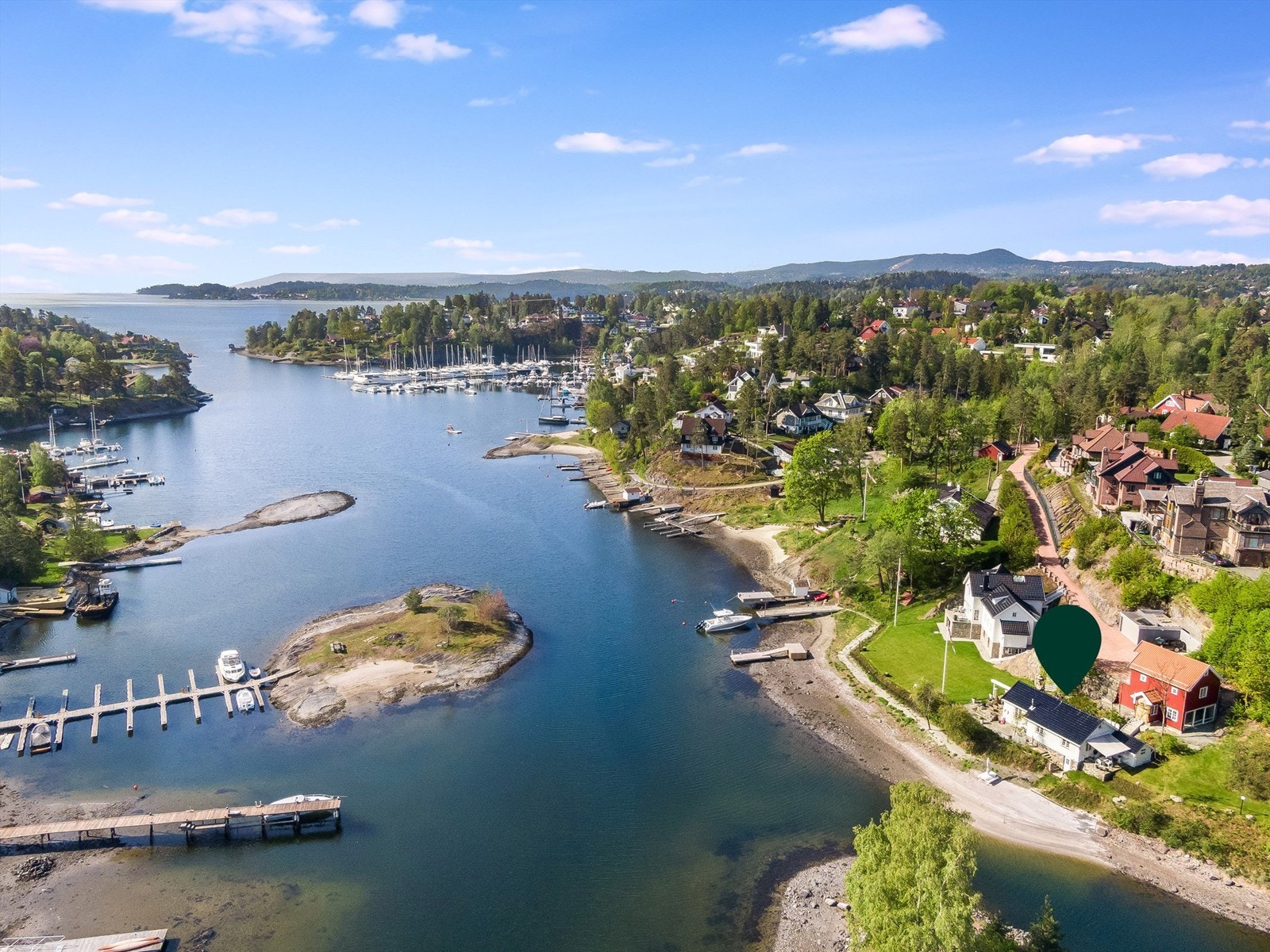 Her er det fantastisk å bo, sommer som vinter. Galleribilde