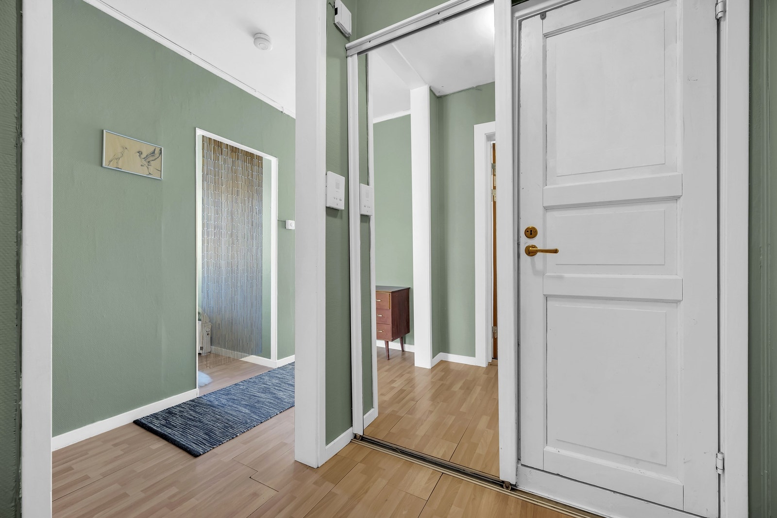 Entré med garderobe Galleribilde